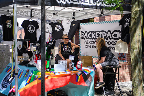 A clothing vendor at a festival