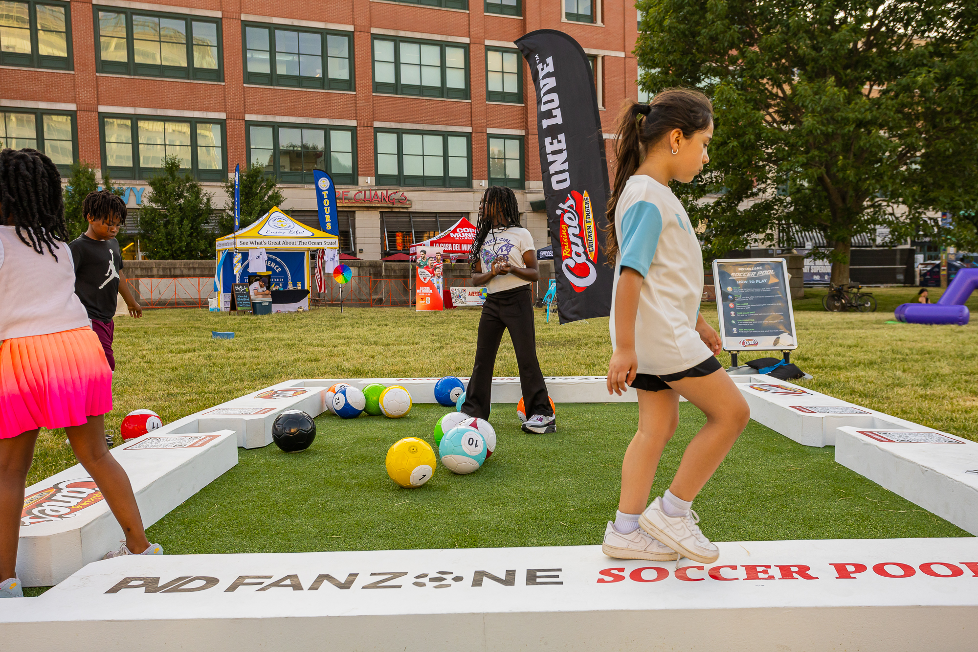 Kids enjoying games at the PVD Fanzone
